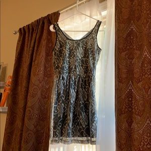 Lace overlay dress, with criss cross back